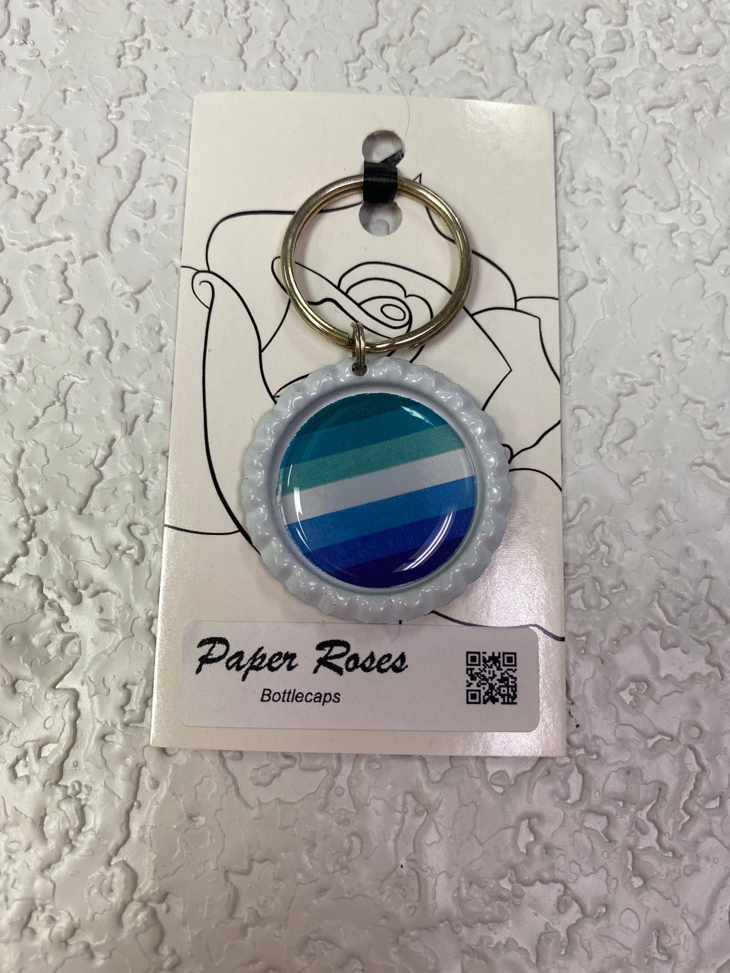 MLM PRIDE BOTTLE CAP KEYCHAIN