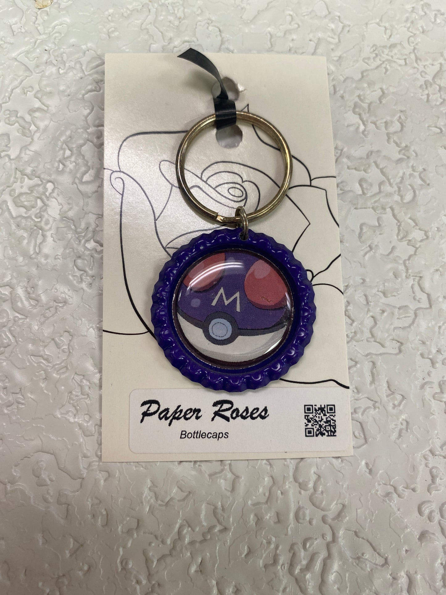 M BALL BOTTLE CAP KEYCHAIN