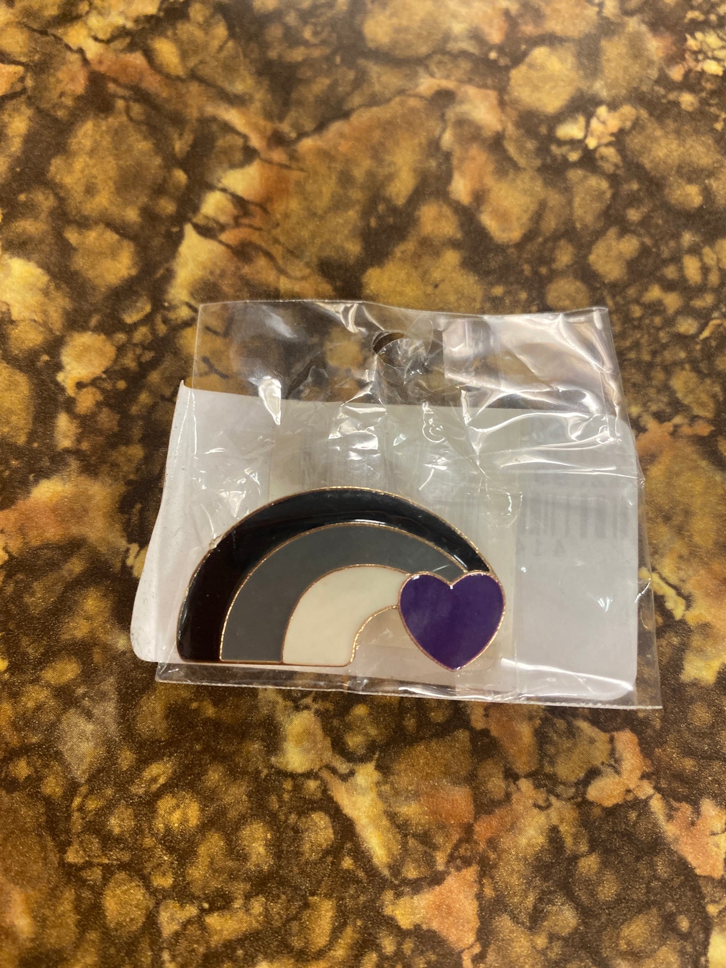 A SEXUAL RAINBOW PIN