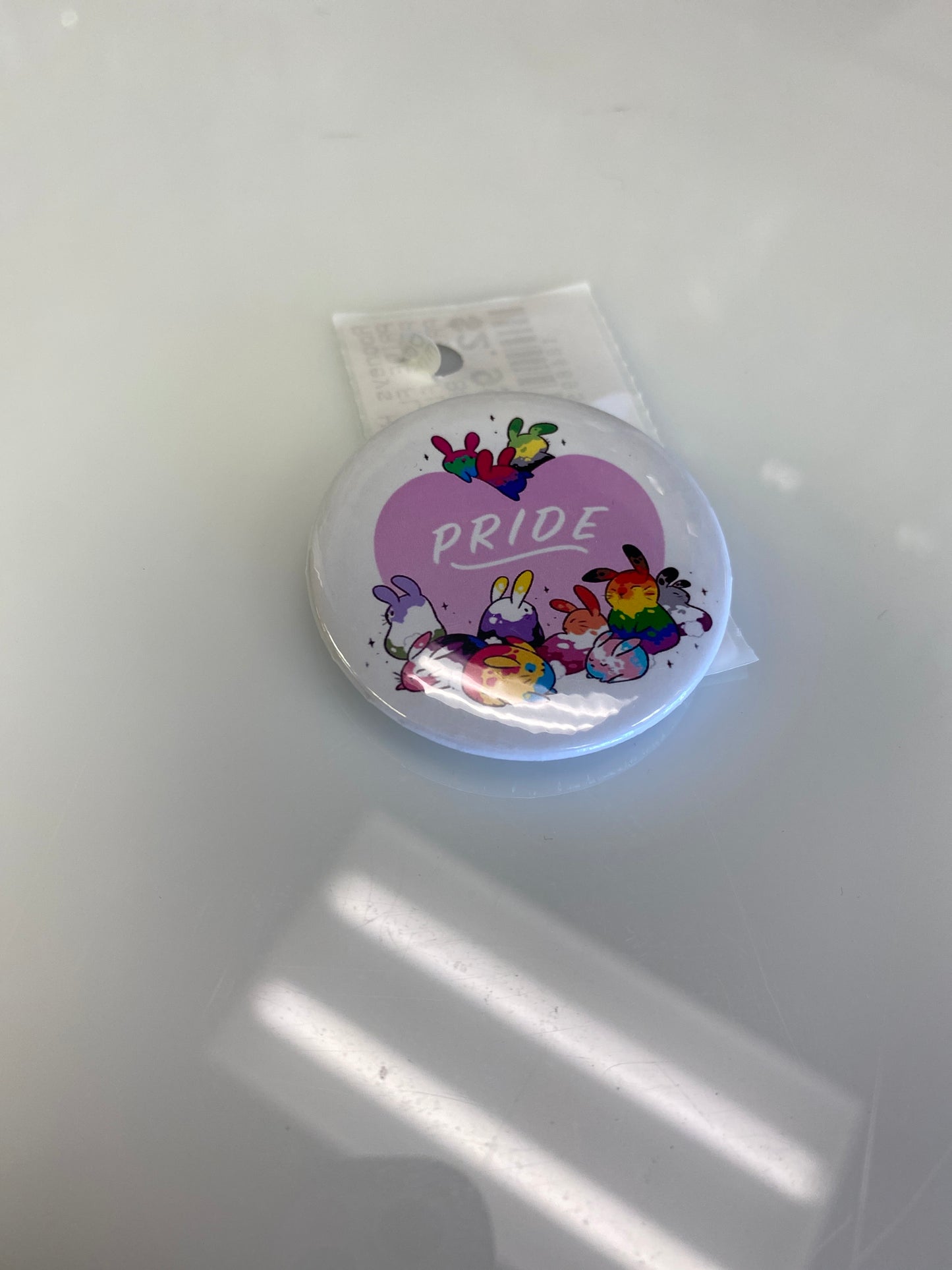 PRIDE FLAGS BUNNIES BUTTON