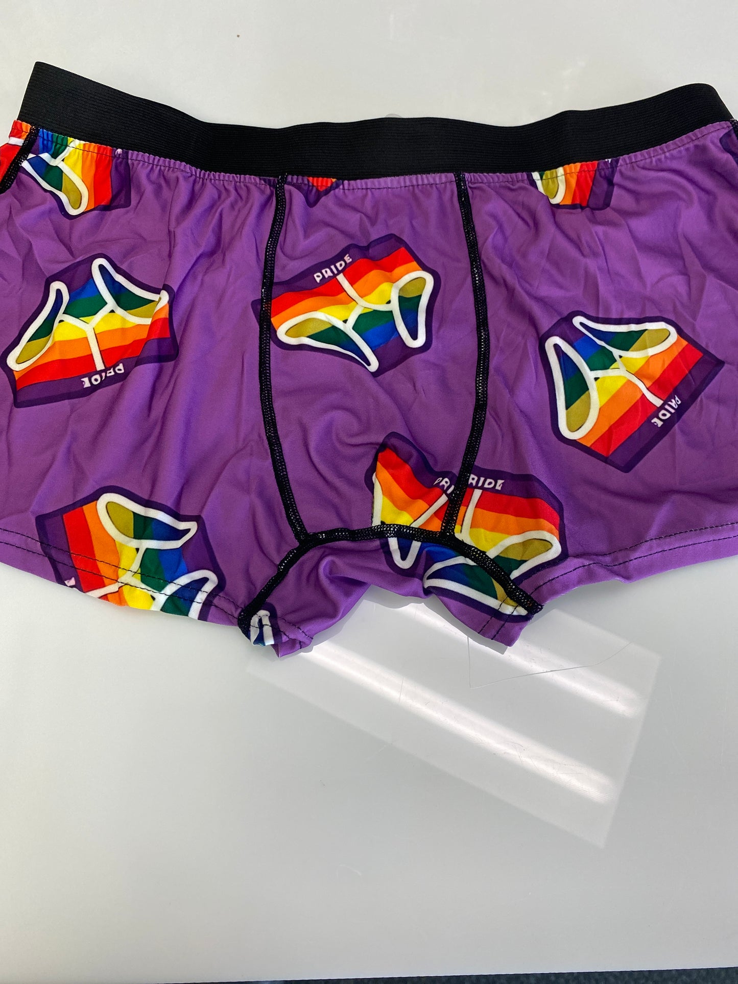RAINBOW UNDERWEAR ON PURPLE UNDERWEAR MED