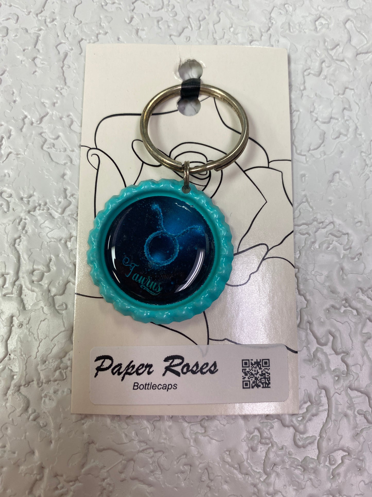 TEAL TAURUS BOTTLE CAP KEYCHAIN