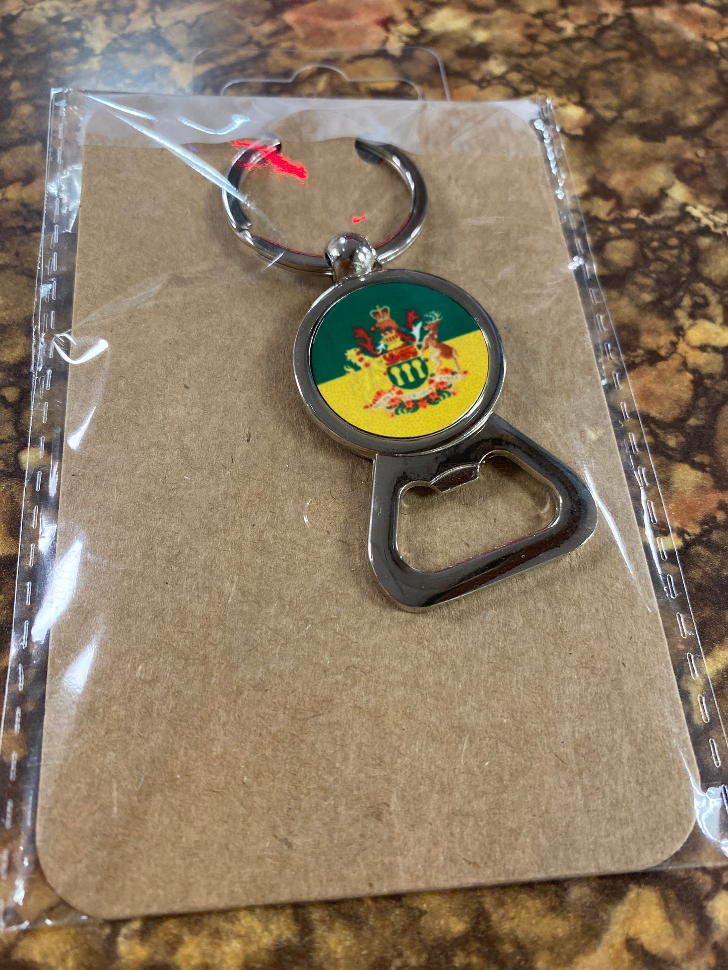 SASK CREST KEYCHAIN WITH BOTTLE OPENER