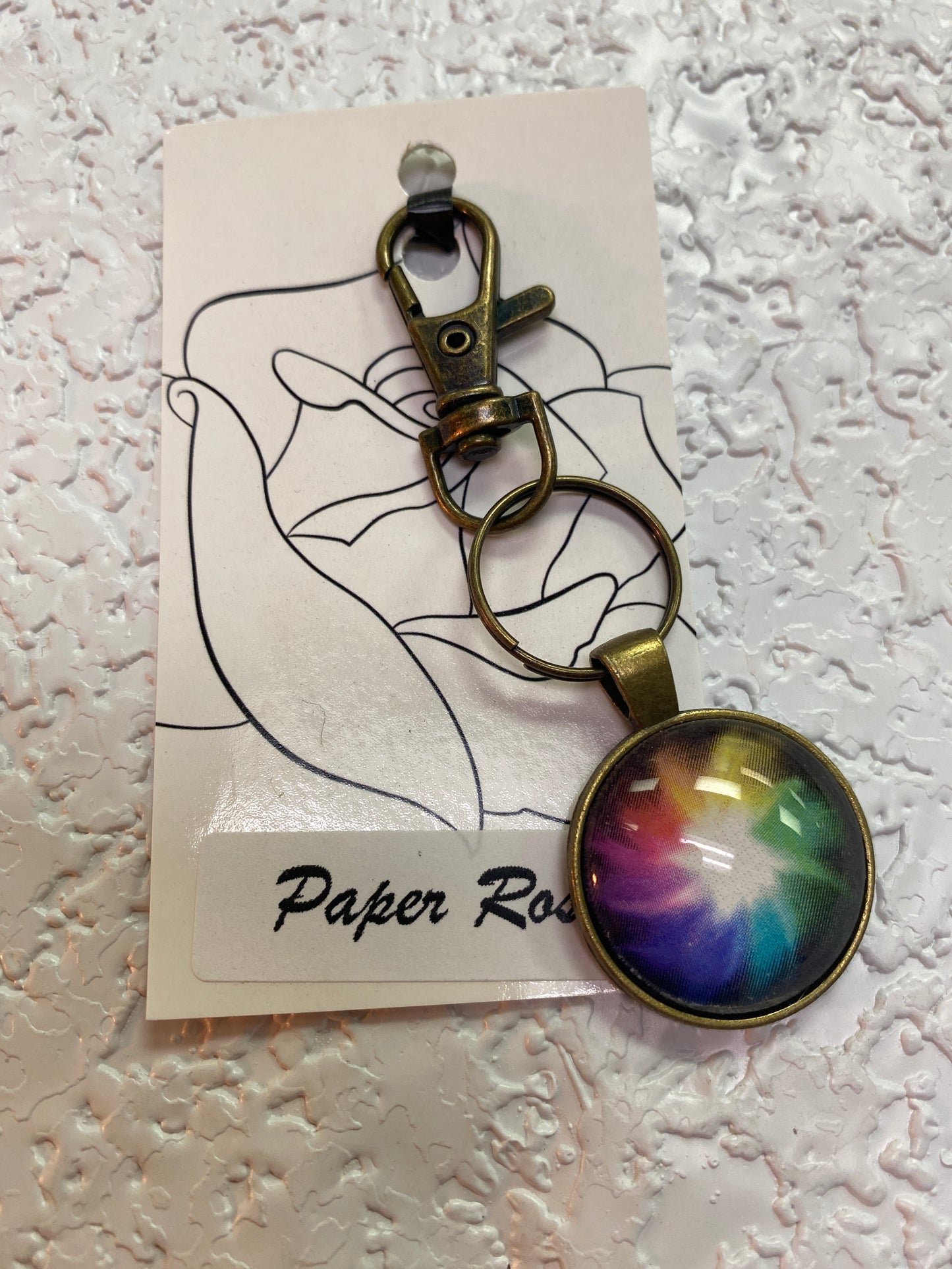 RAINBOW STAR BURST BRONZE KEYCHAIN