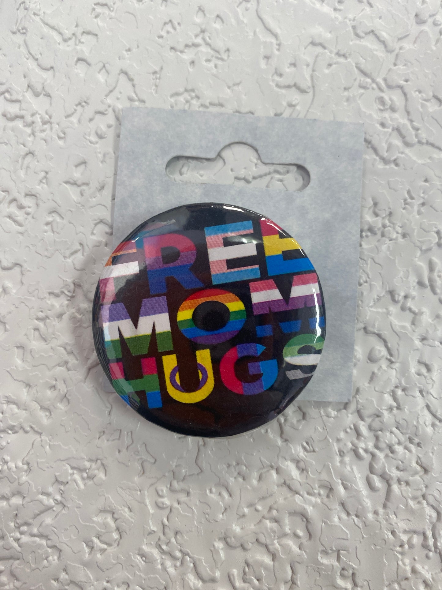 FREE MOM HUGS BUTTON