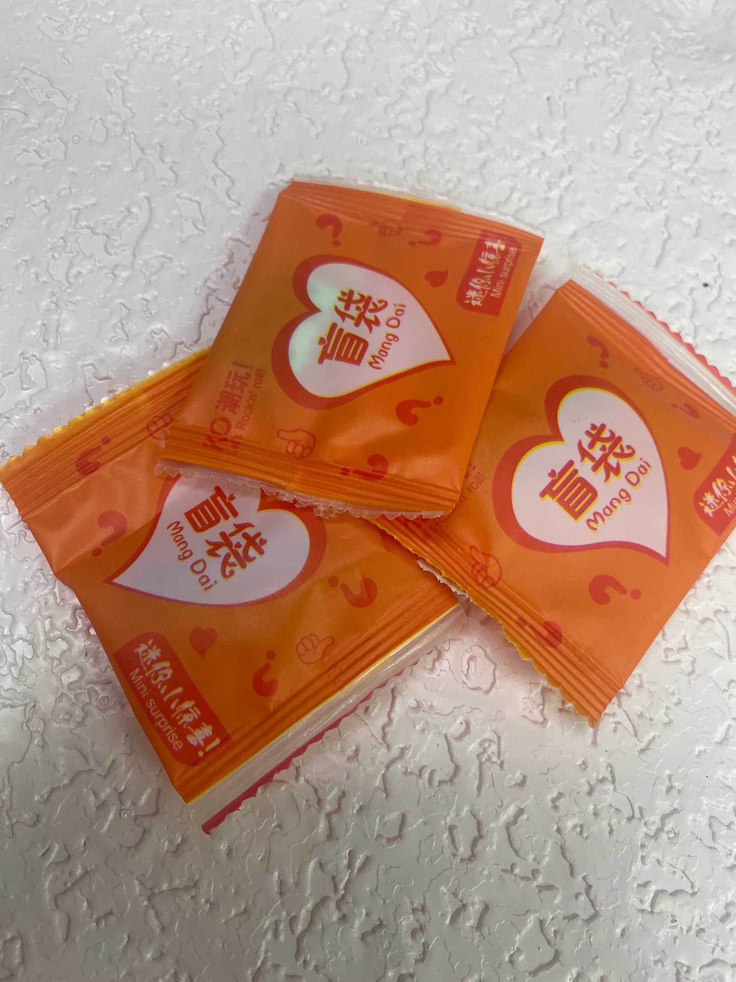 MINI SURPRISE ORANGE BAG