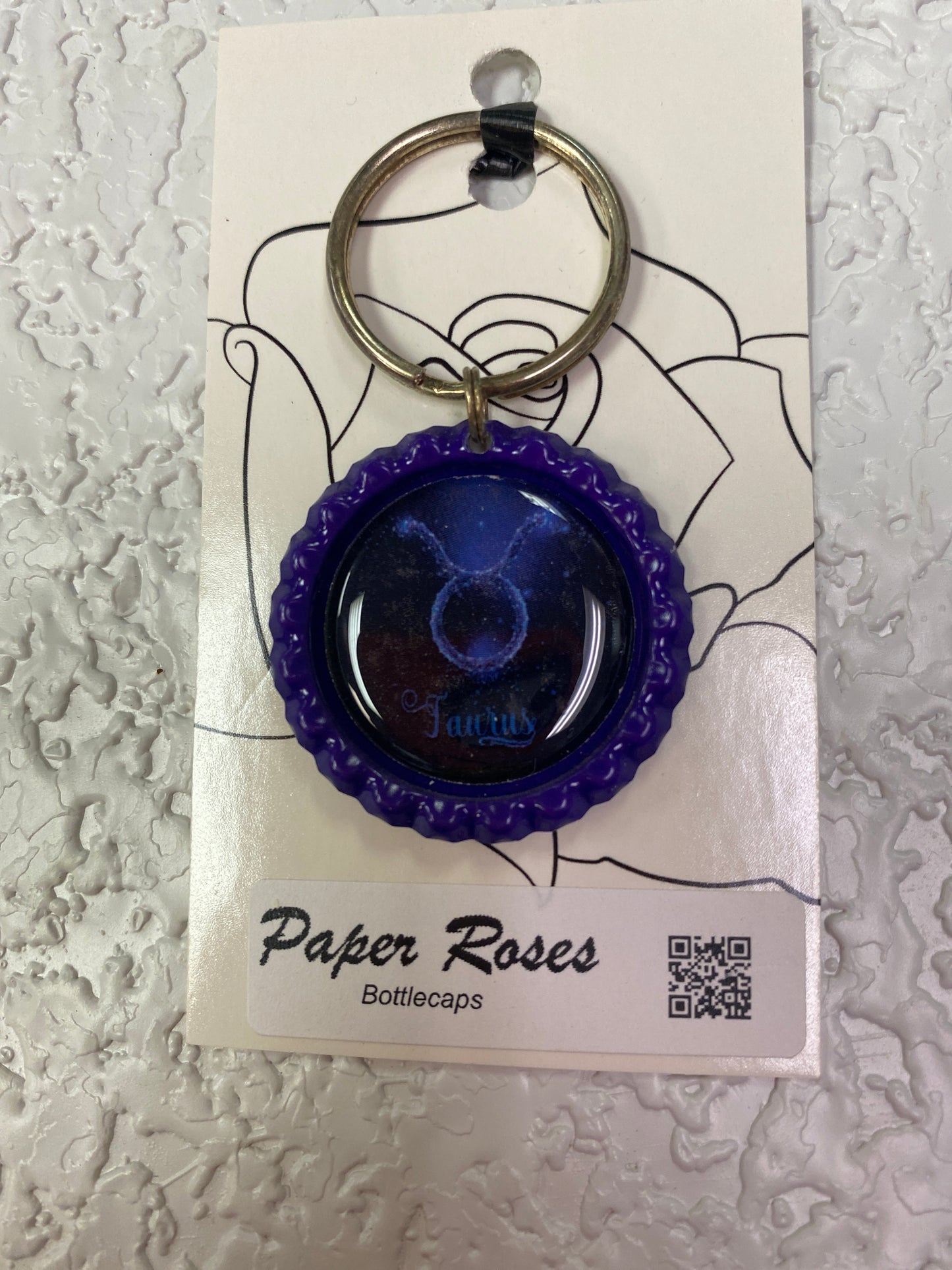 PURPLE TAURUS BOTTLE CAP KEYCHAIN