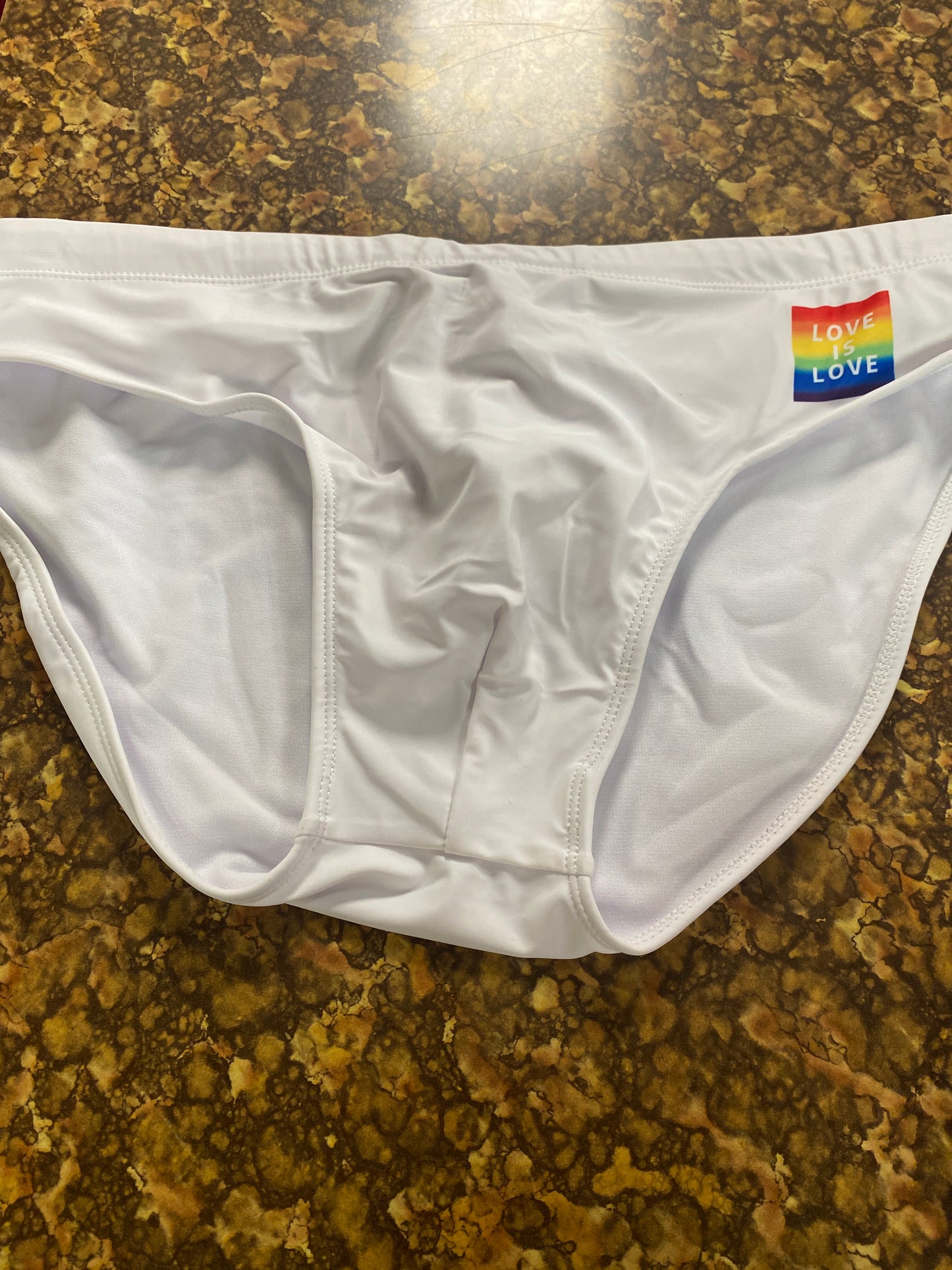 MENS SWIM BRIEFS LOVE IS LOVE WHITE