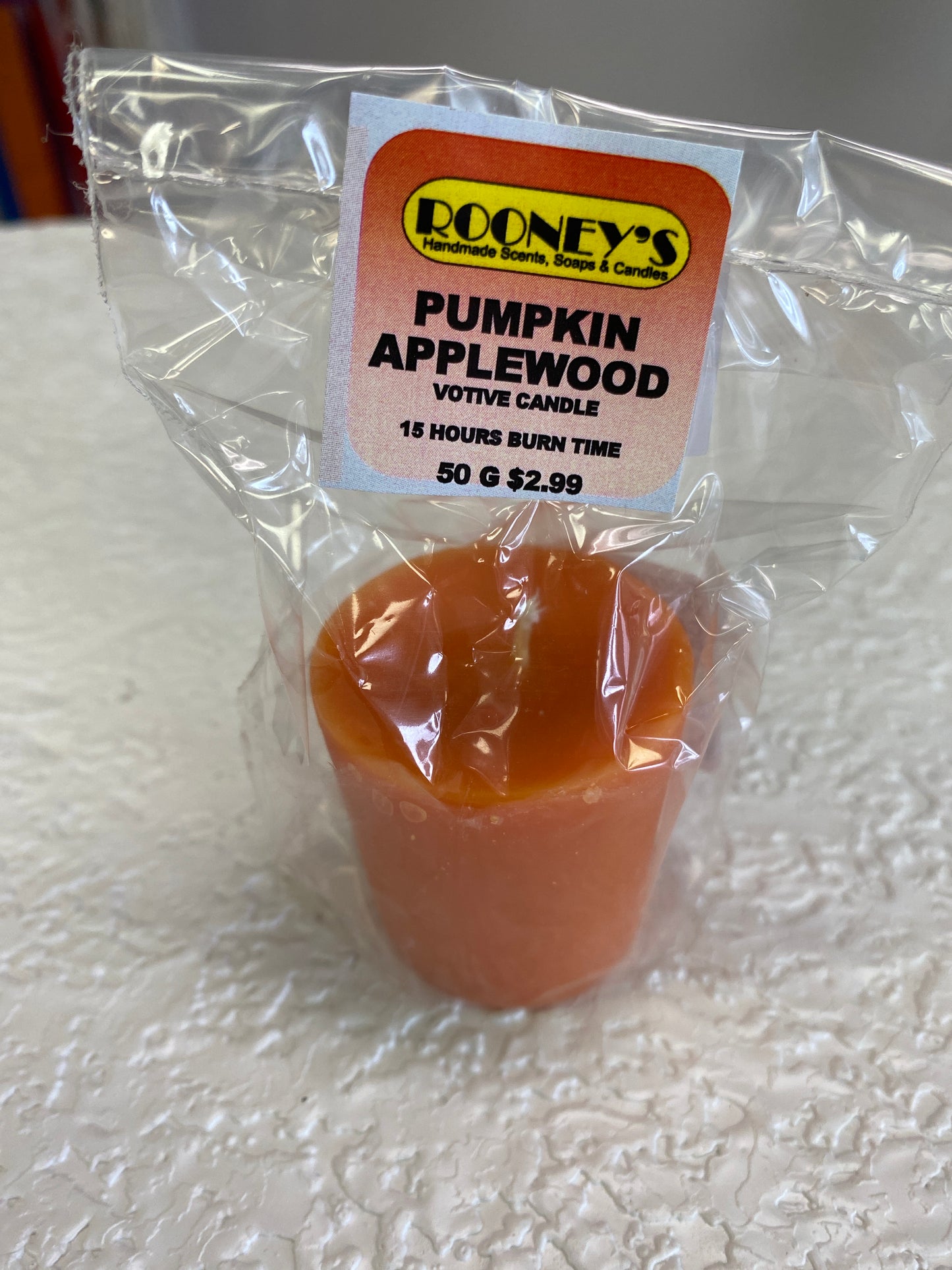 PUMPKIN APPLEWOOD VOTIVE CANDLE