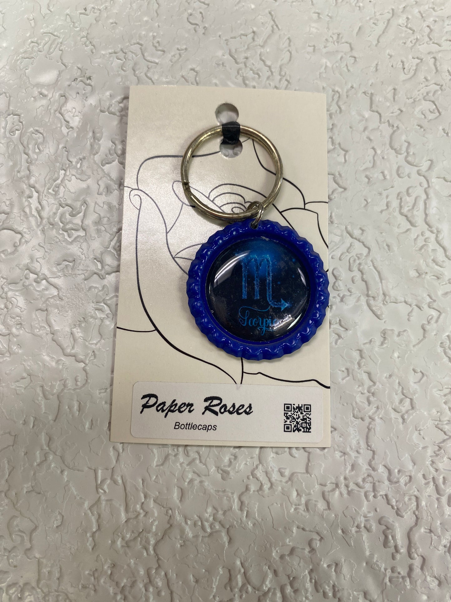 BLUE SCORP BOTTLE CAP KEYCHAIN