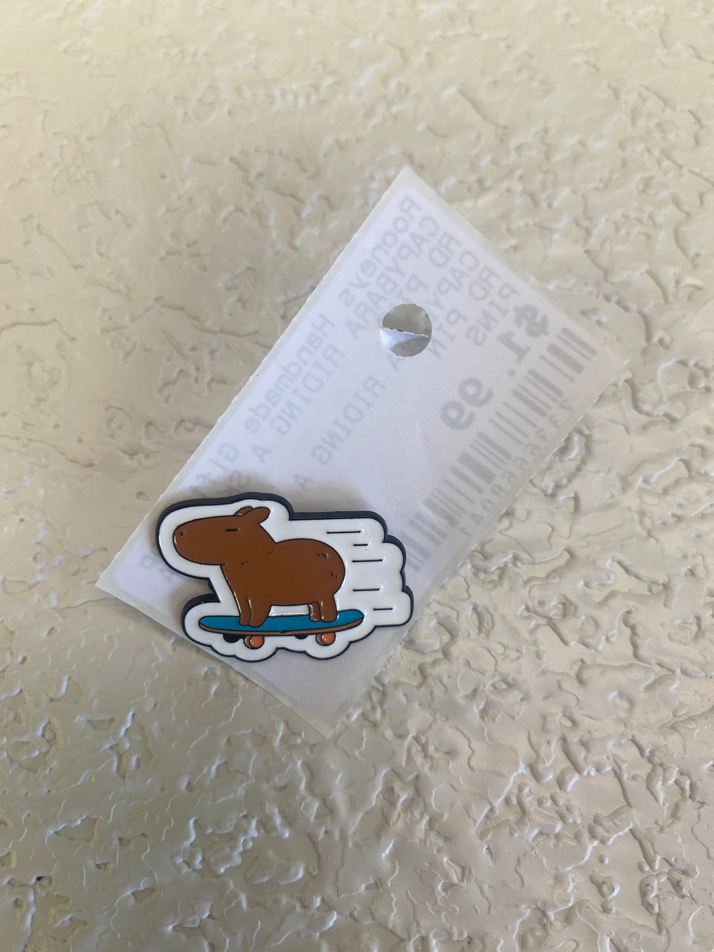 CAPYBARA RIDING A SKATEBOARD PIN