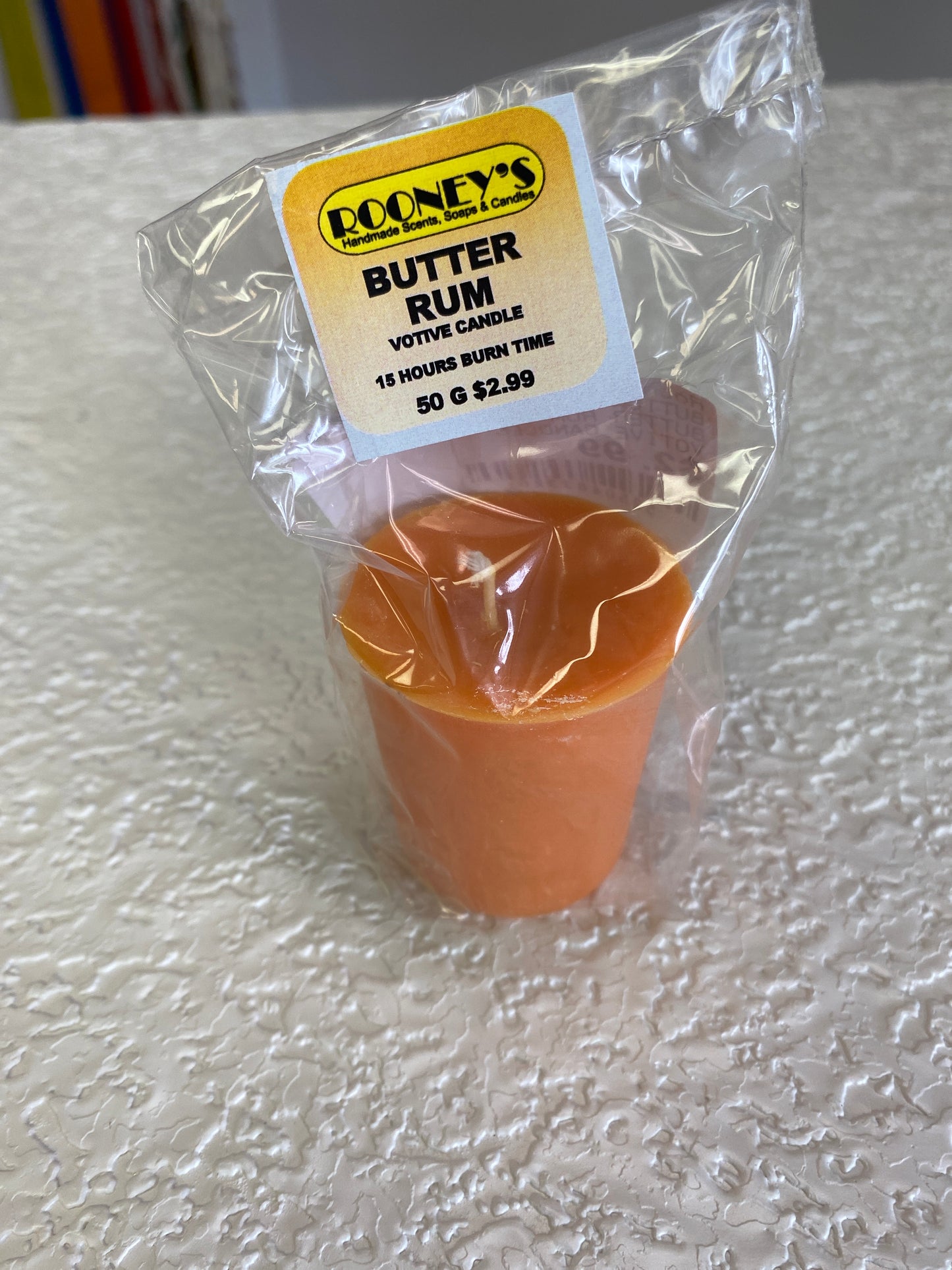 BUTTER RUM VOTIVE CANDLE