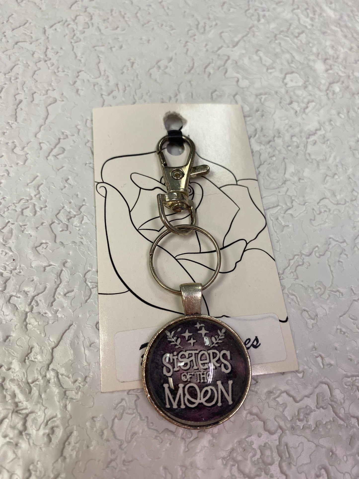 SISTER OF THE MOON SILVER KEYCHAIN