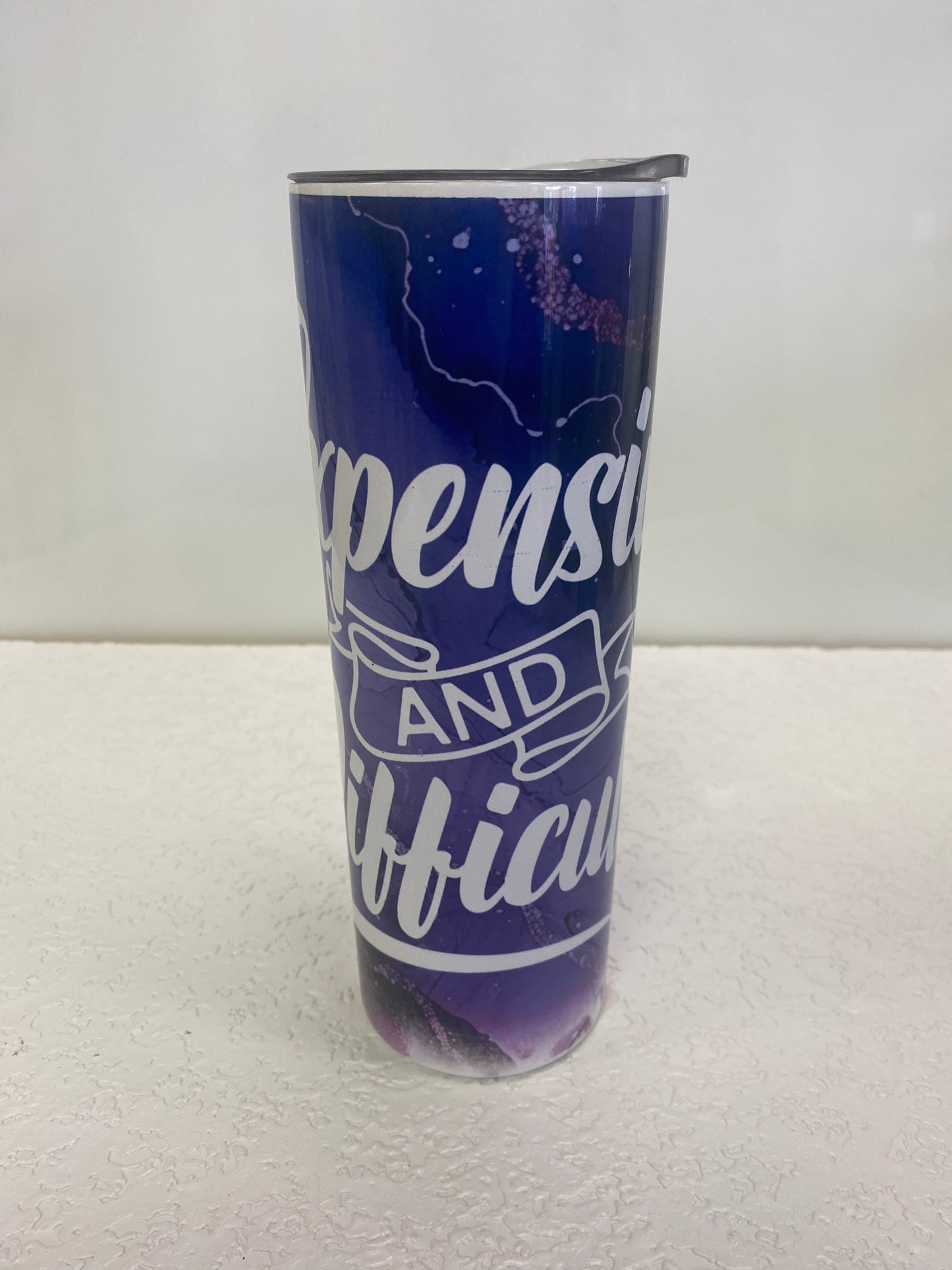 EXPENSIVE AND DIFFICULT TUMBLER