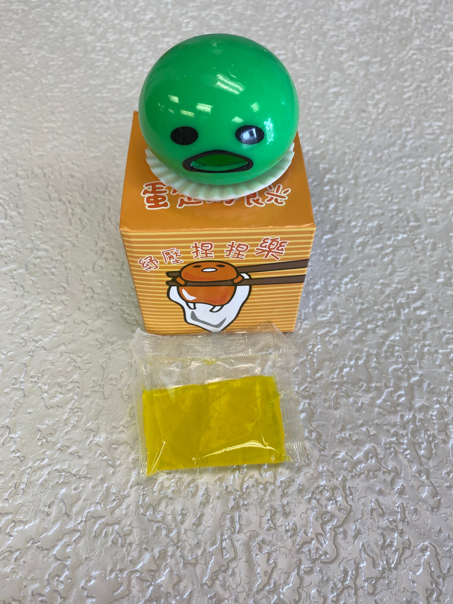 PUKING EGG YOLK STRESS BALL GREEN