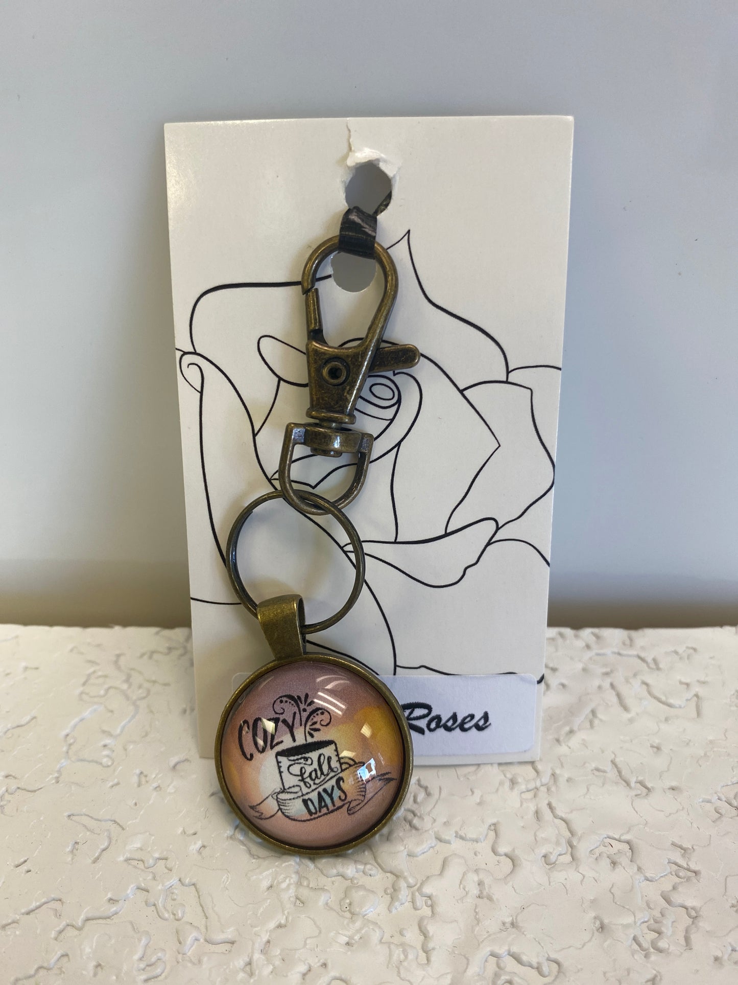 BRONZE COZY KEYCHAIN