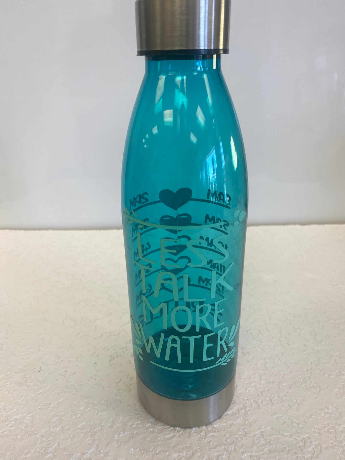 PLASTIC AND METAL LESS TALK MORE WATER BOTTLE GREE