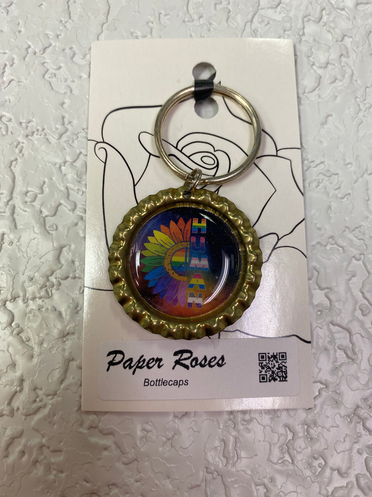 GOLD PRIDE HUMAN FLOWER BOTTLE CAP KEYCHAIN