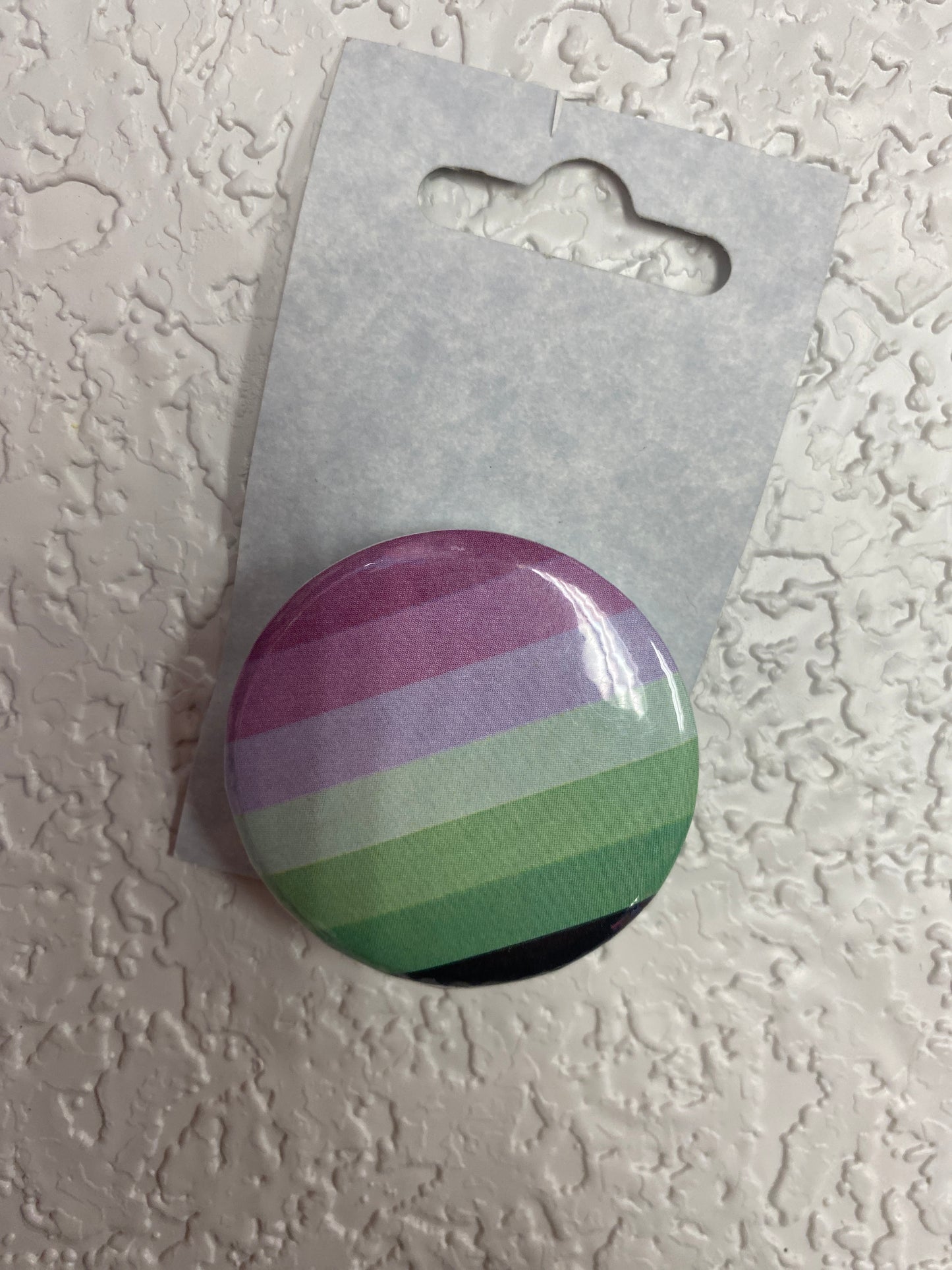 TORIC FLAG BUTTON
