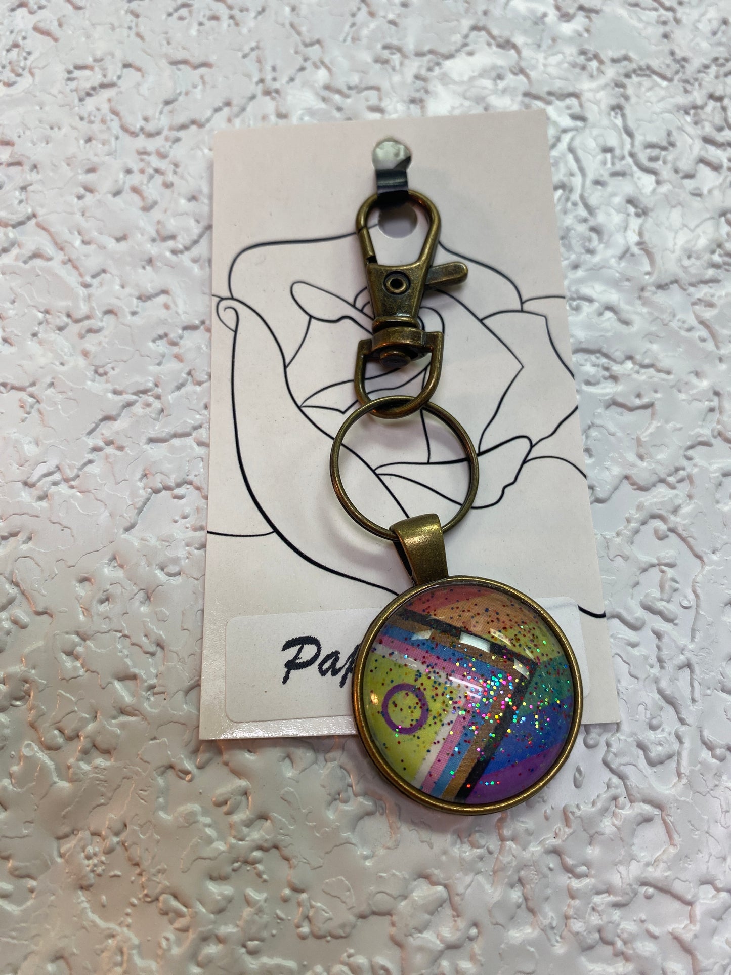 NEW PROGRESS FLAG BRONZE KEYCHAIN