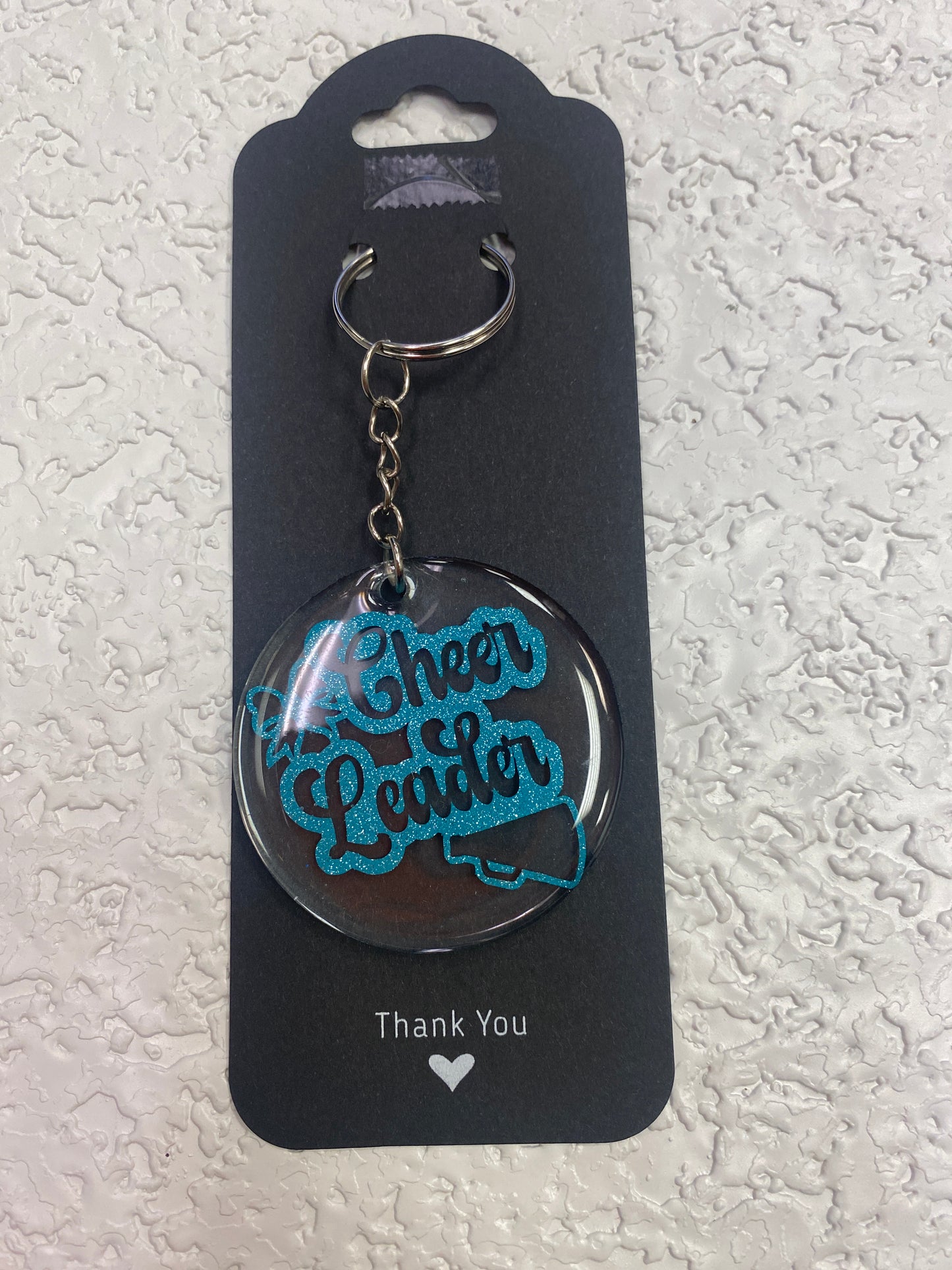 KEYCHAIN CHEER LEADER TEAL GLITTER