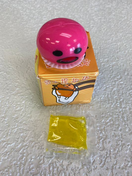 PUKING EGG YOLK STRESS BALL PINK