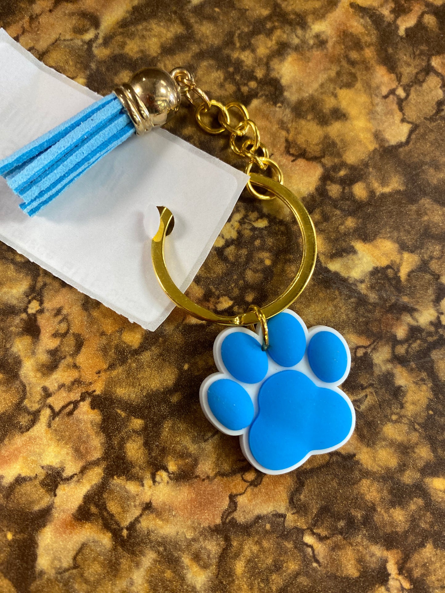 PAW KEYCHAIN LIGHT BLUE