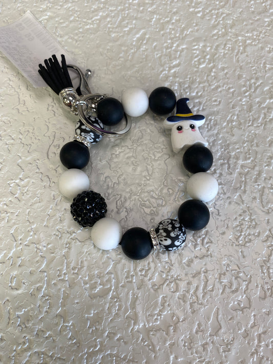 BLACK & WHITE GHOST WITCH SILICONE BRACE KEYCHAIN