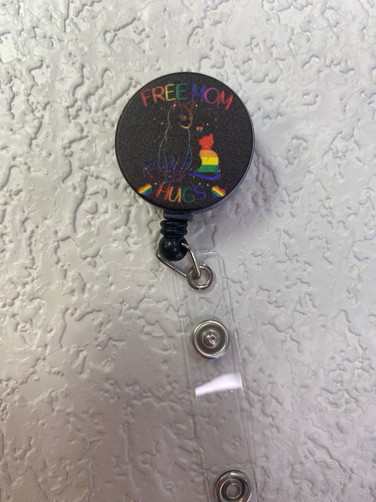 PRIDE FREE MOM HUGS BADGE HOLDER