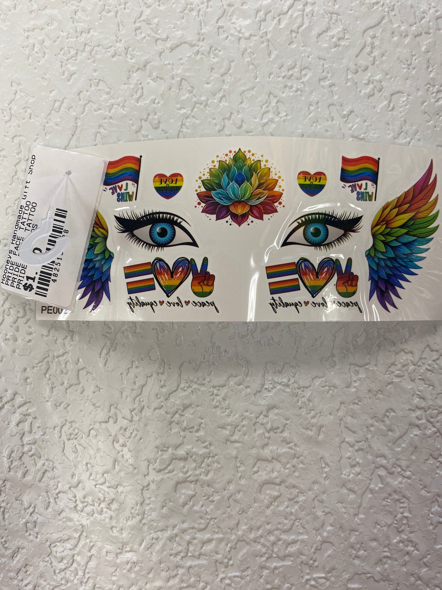 PRIDE FACE TATTOO WINGS