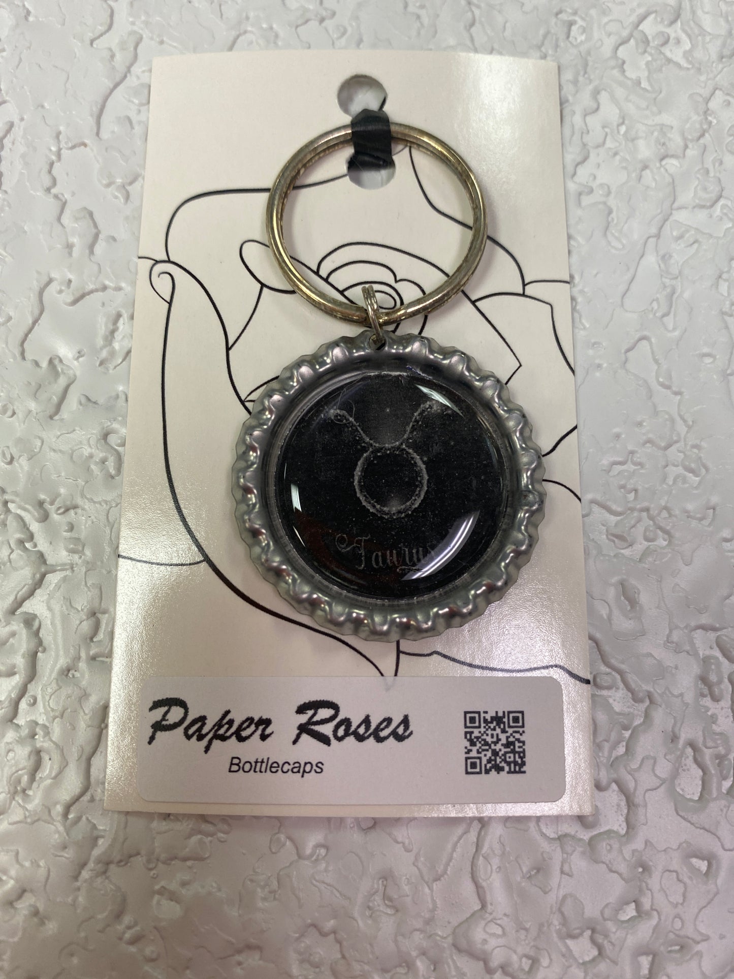 SILVER TAURUS BOTTLE CAP KEYCHAIN