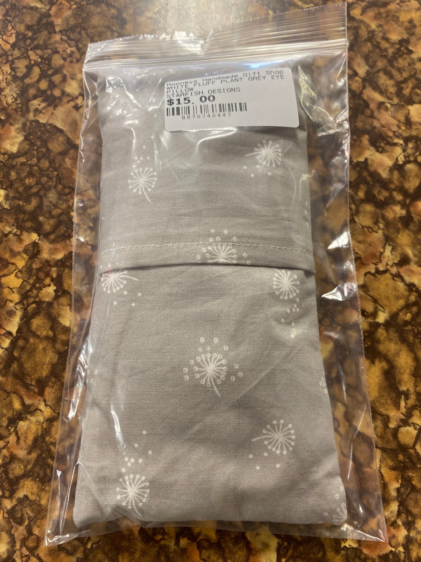 WHITE FLUFF PLANT GREY EYE PILLOW
