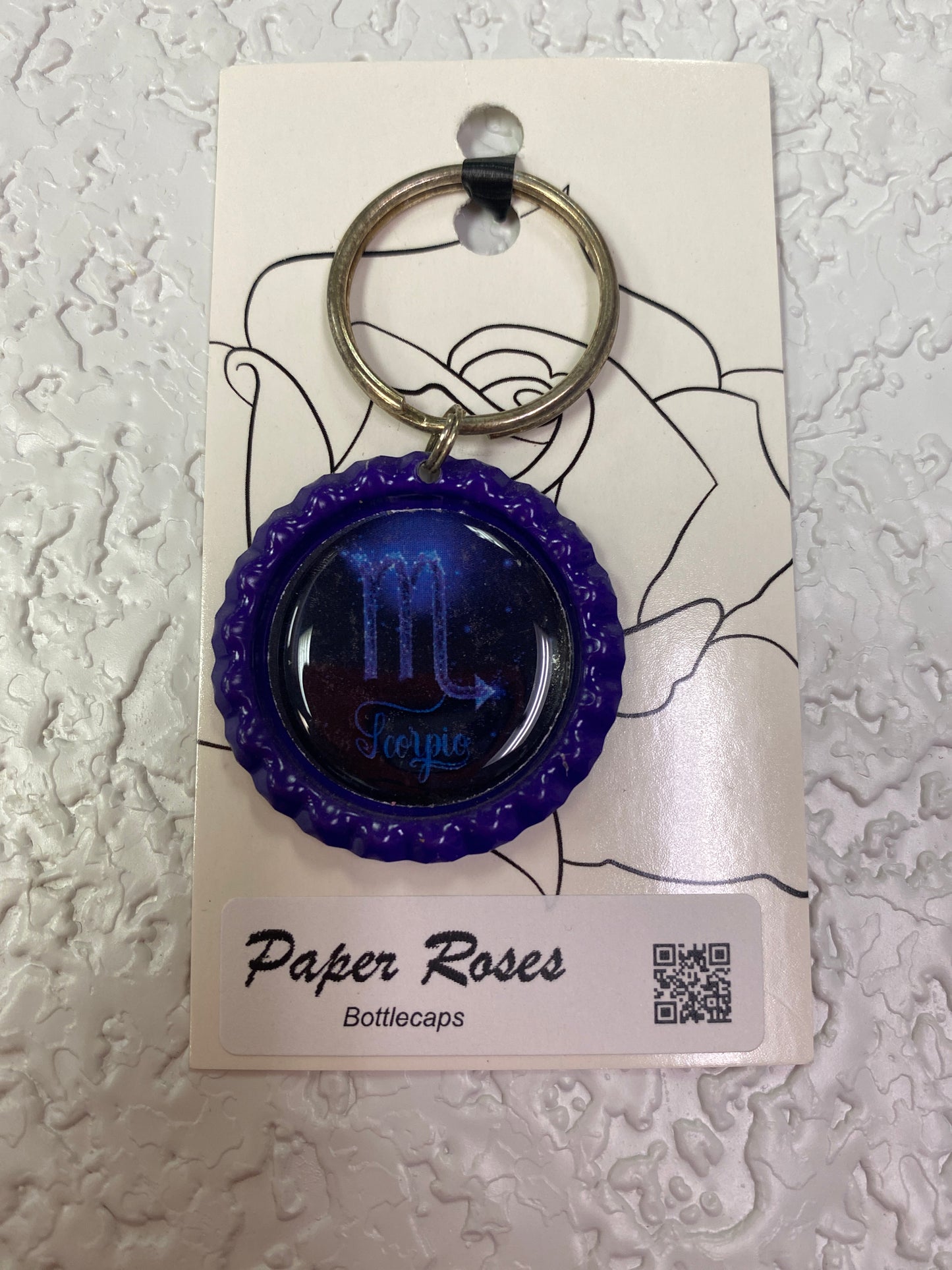 PURPLE SCOR BOTTLE CAP KEYCHAIN