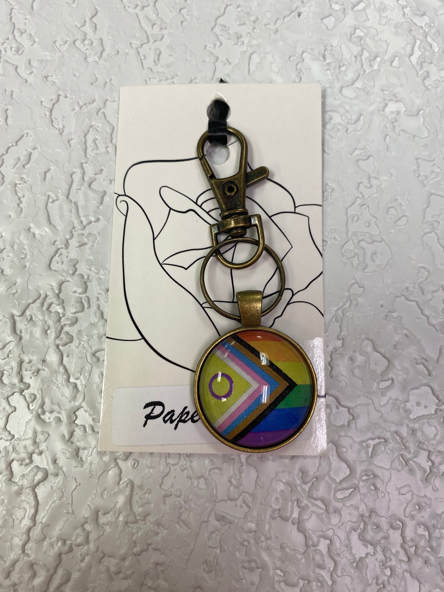 PROGRESS PRIDE BRONZE KEYCHAIN