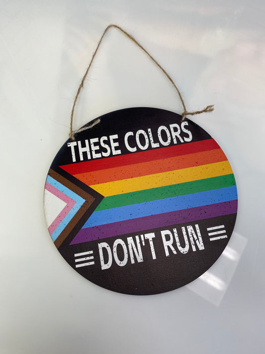 THESE COLORS DONT RUN PRIDE ROUND WOOD DECOR