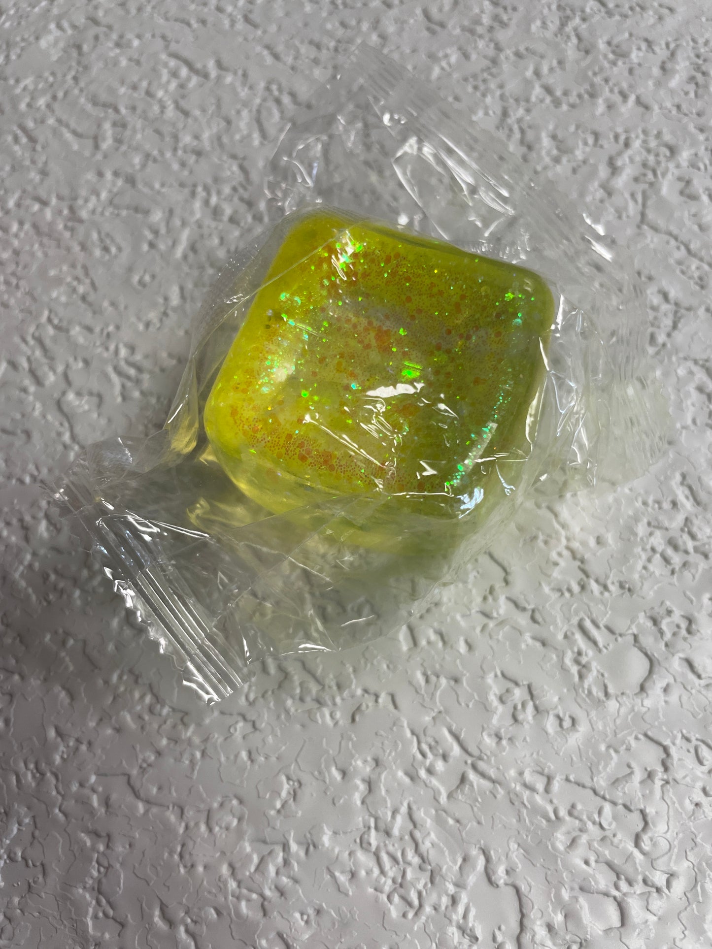LG YELLOW GLITTER SQUISH