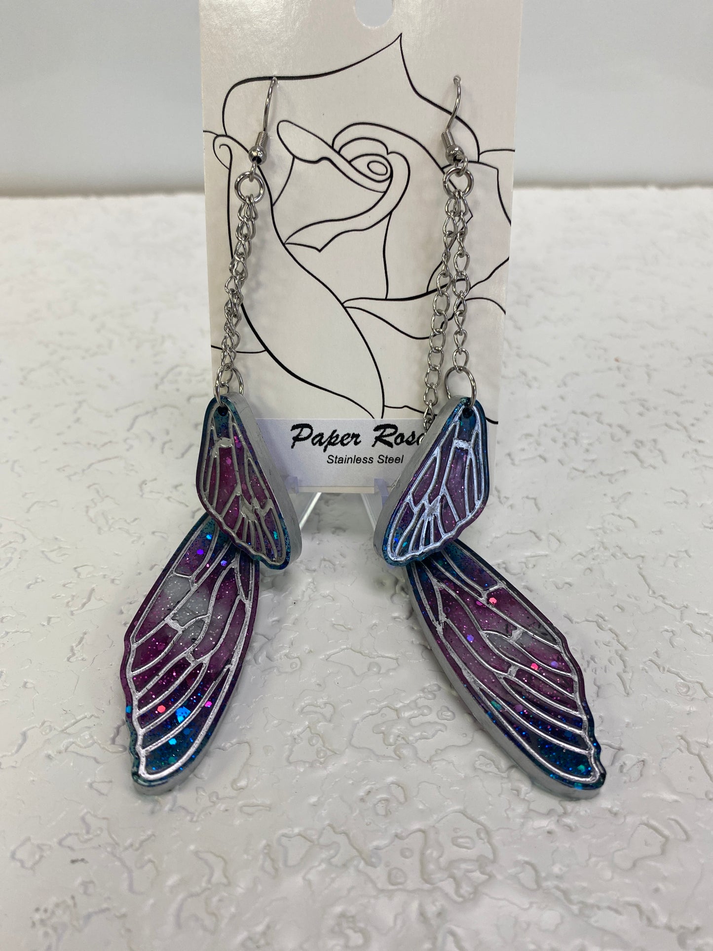 TWO WINGS TRANS DANGLING EARRINGS