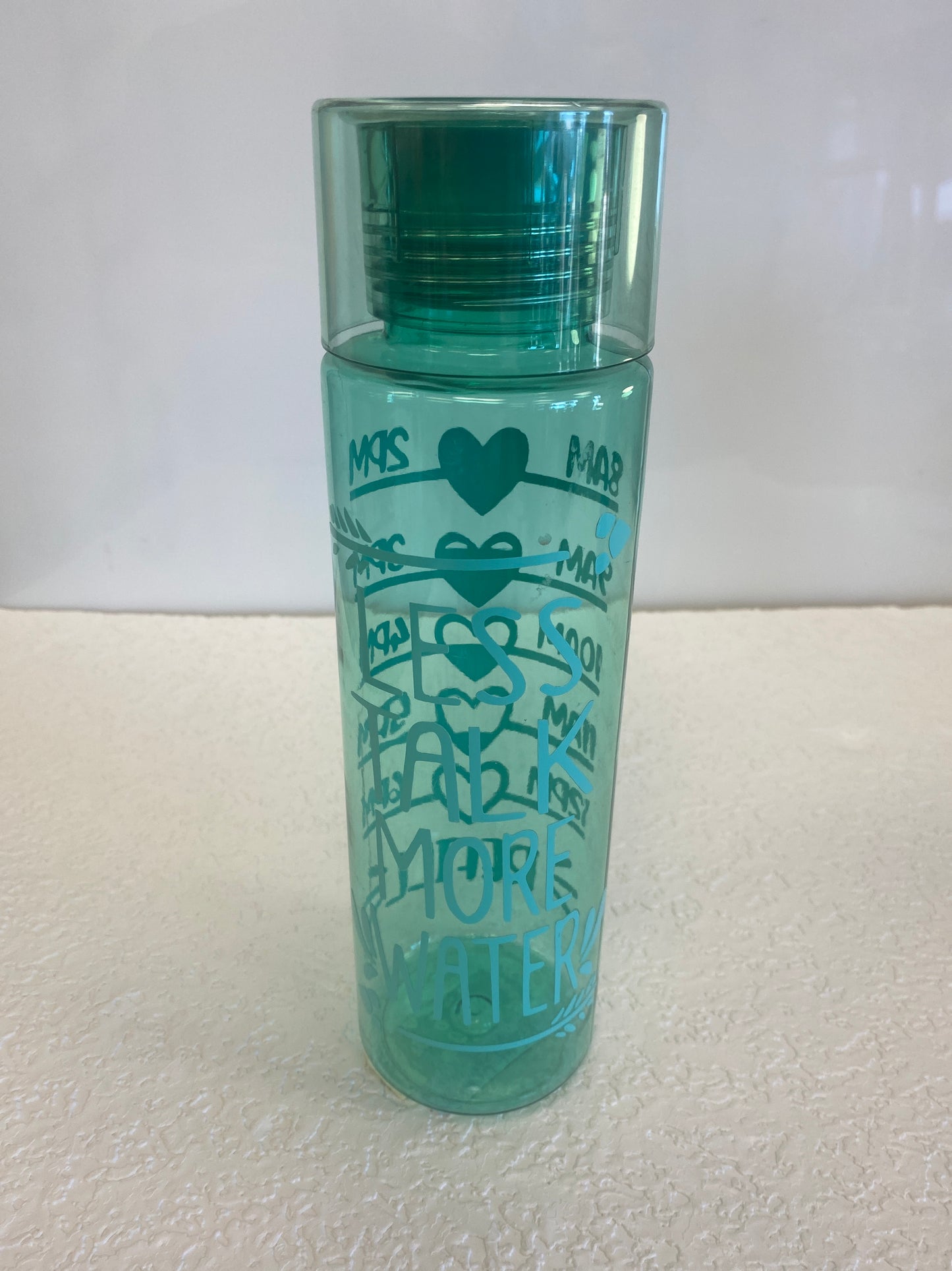 PLASTIC GREEN LESS TAKE MORE WATER BOTTLE