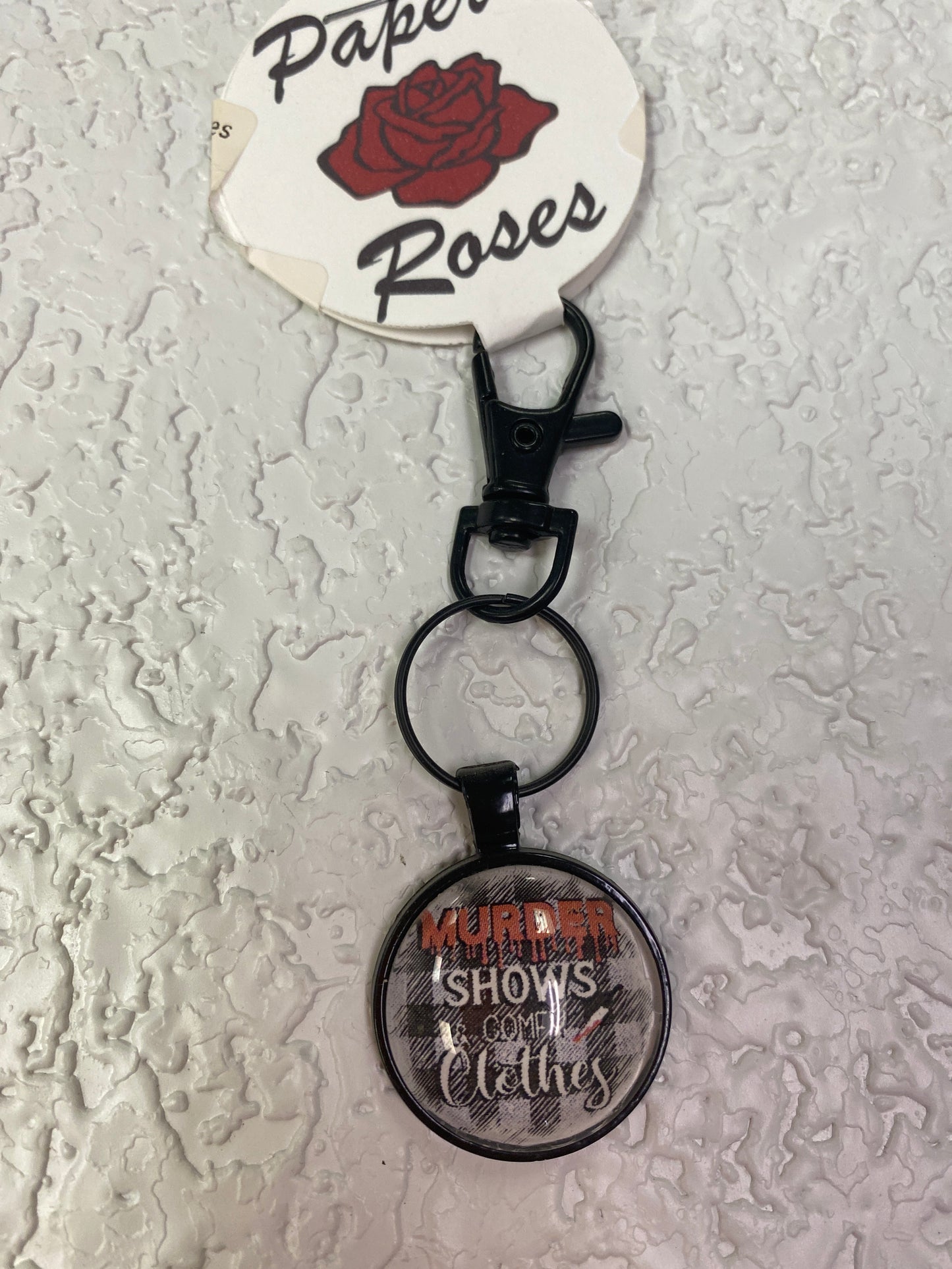 MURDER SHOW BLACK KEYCHAIN