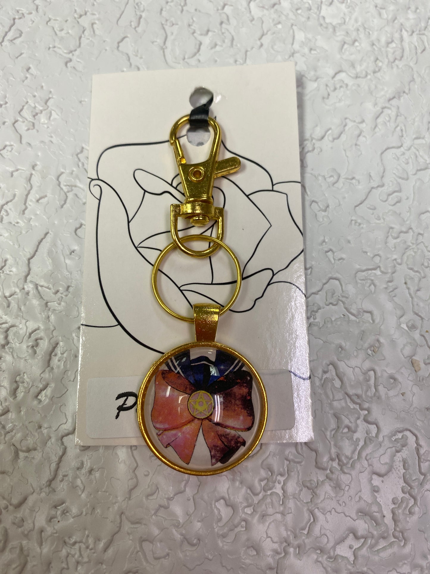 SAILOR MOON GOLD KEYCHAIN