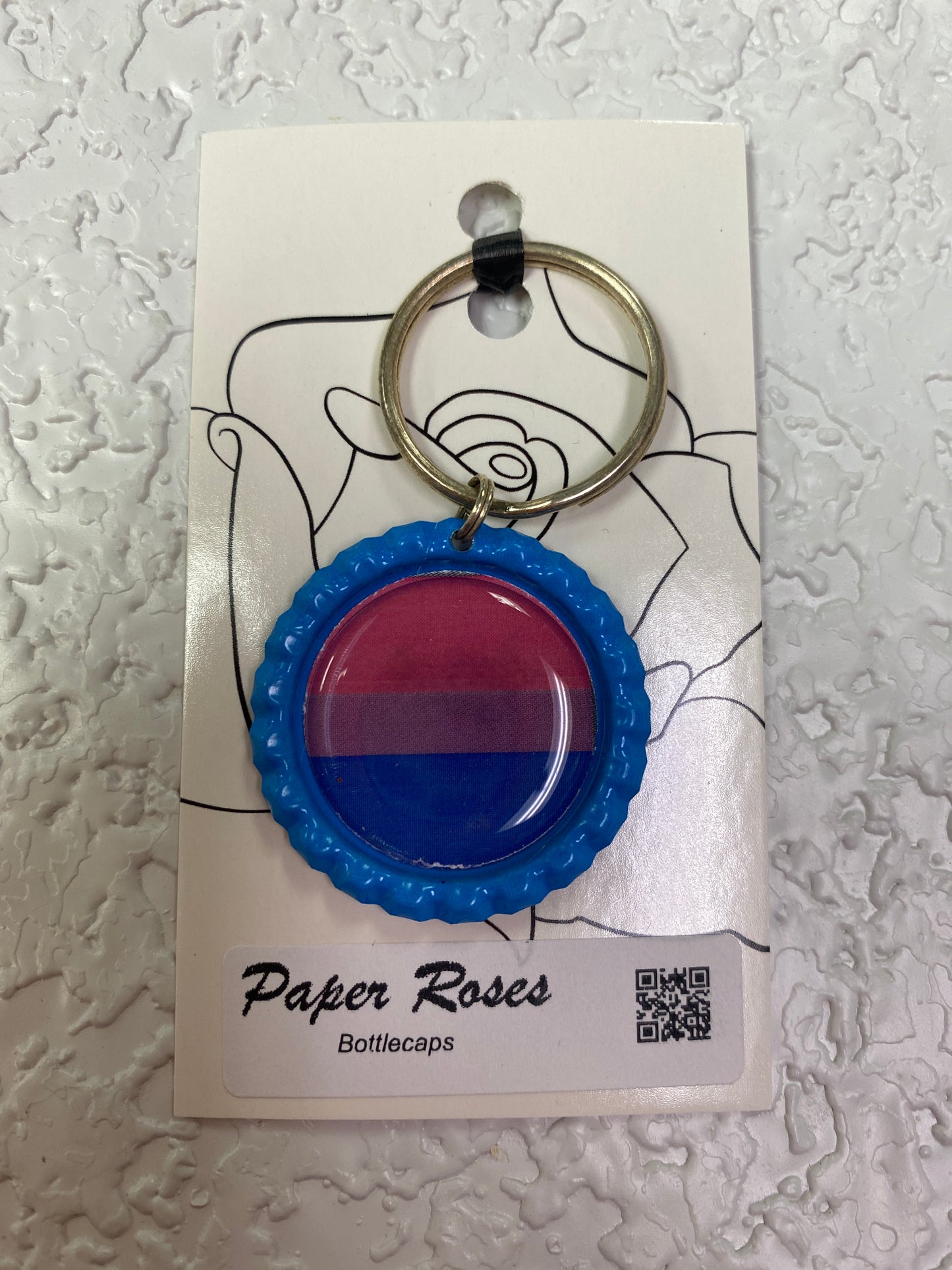 BLUE PRIDE BOTTLE CAP KEYCHAIN