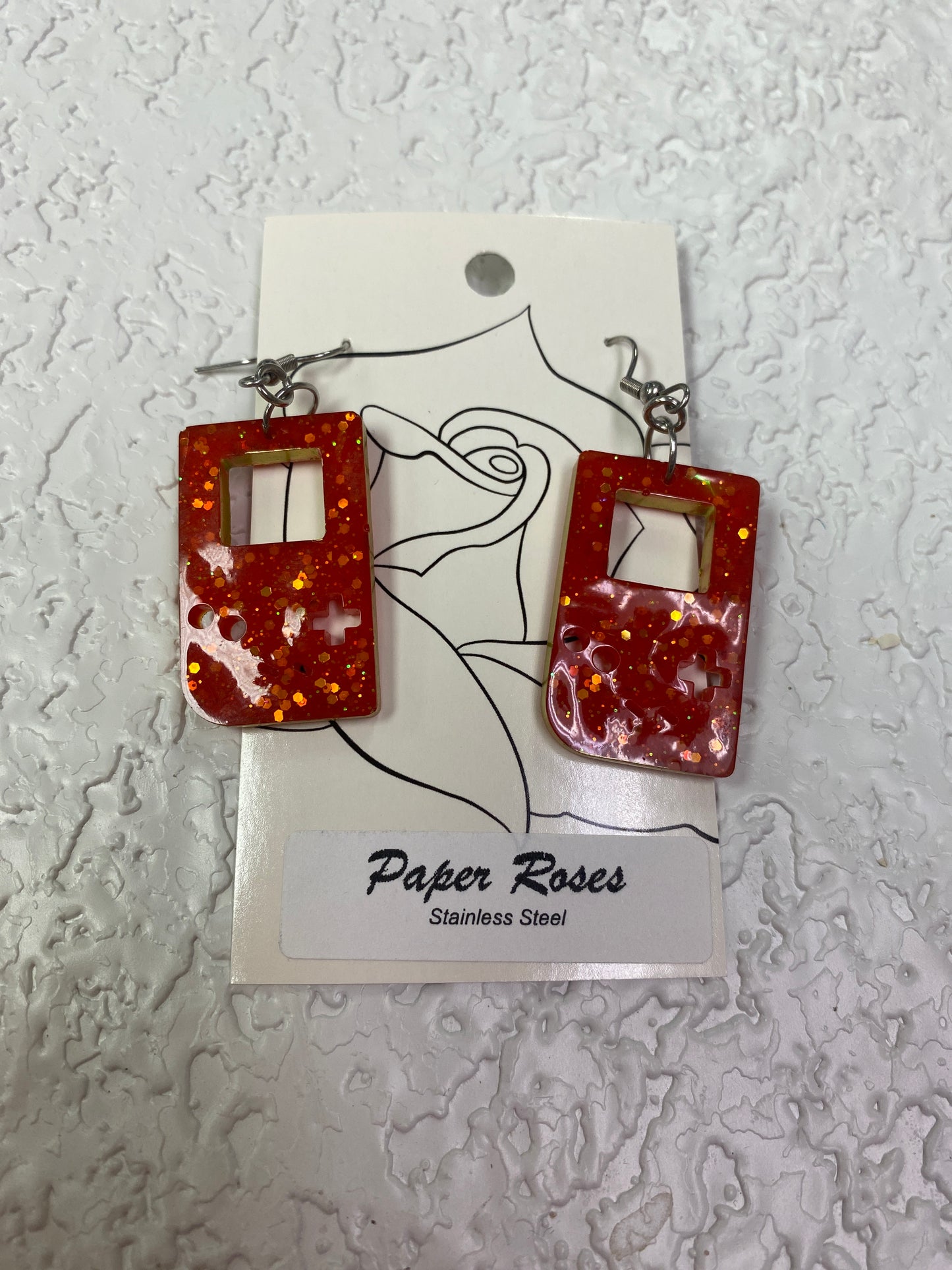 ORANGE GLITTER RETRO GAME EARRINGS
