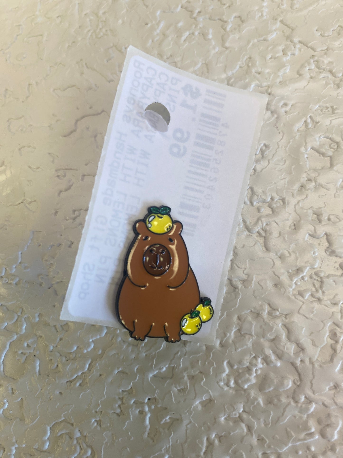 CAPYBARA WITH LEMONS PIN