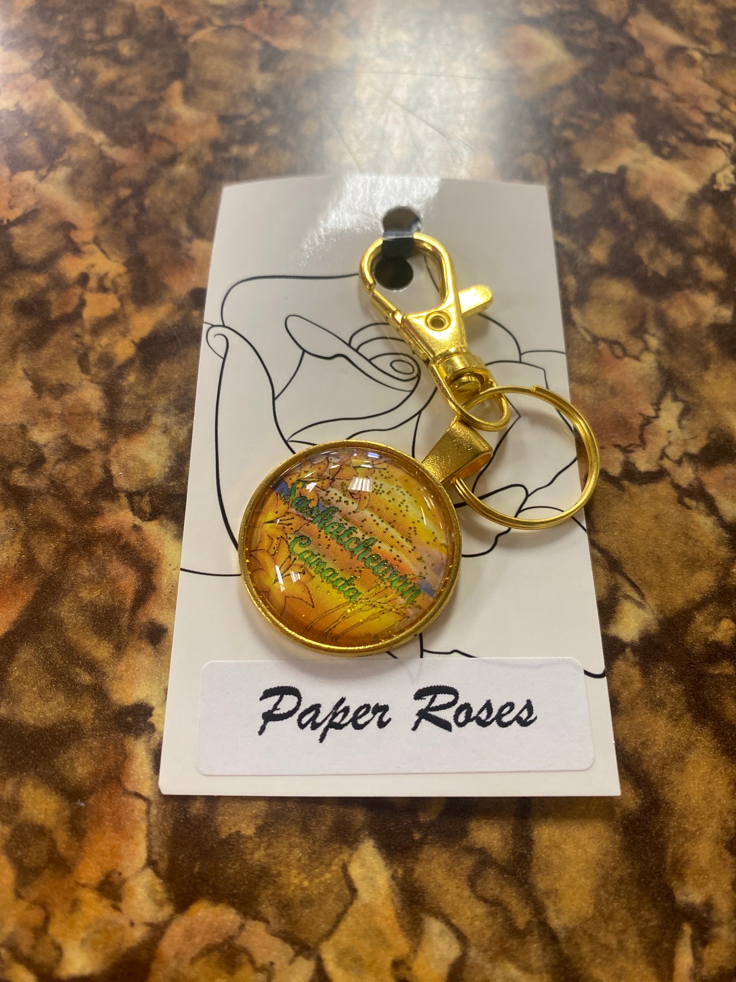 SASKATCHEWAN CANADA GLITTER GOLD KEYCHAIN