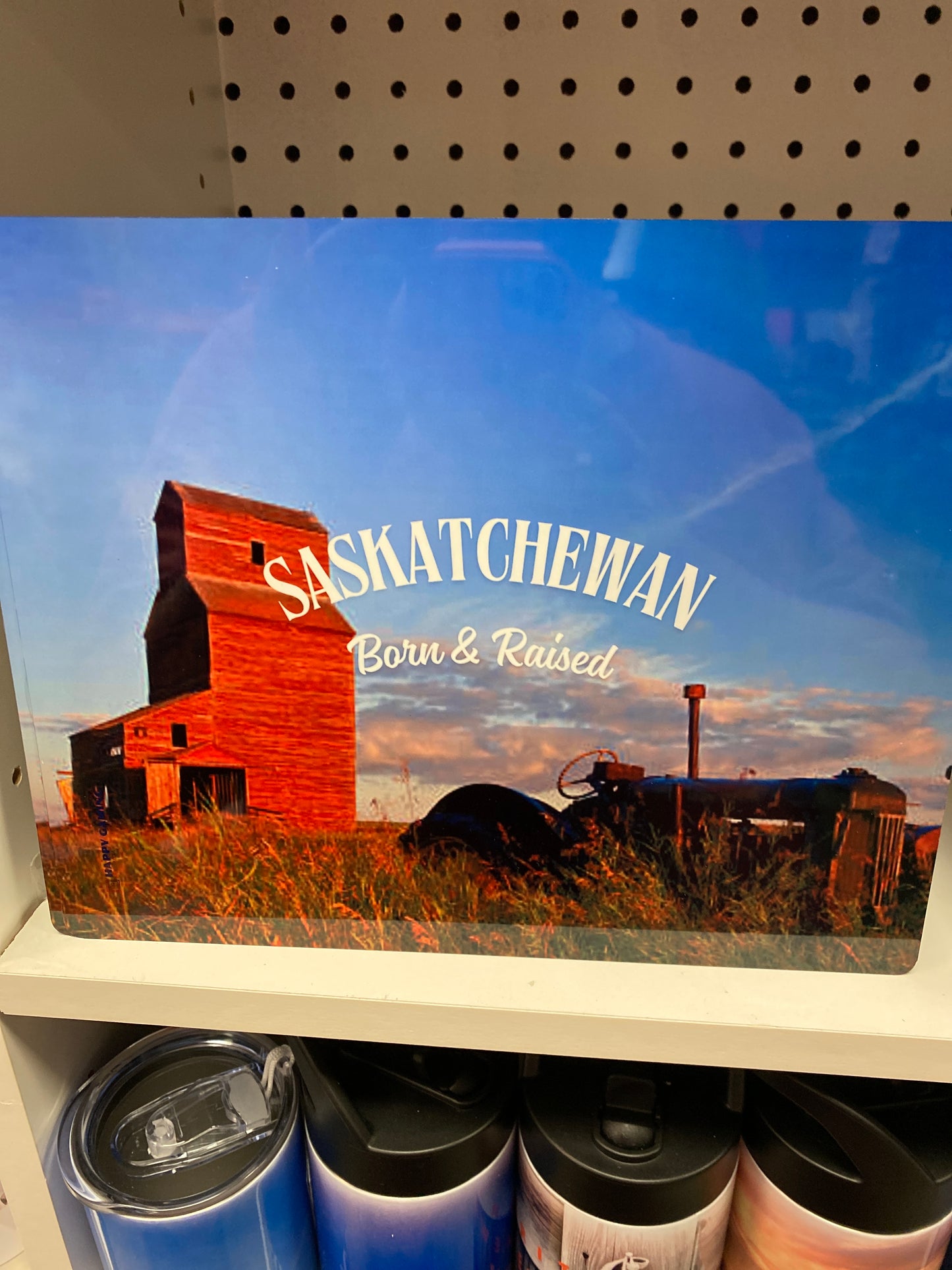 Tin poster Saskatchewan born & raised