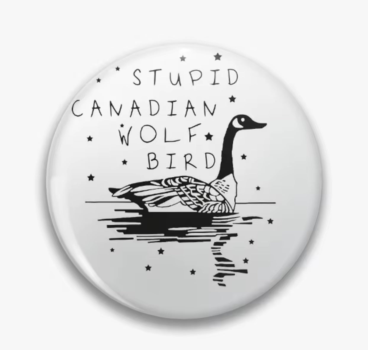 STUPID CANADIAN WOLF BIRD SMALL BUTTON 1.25IN