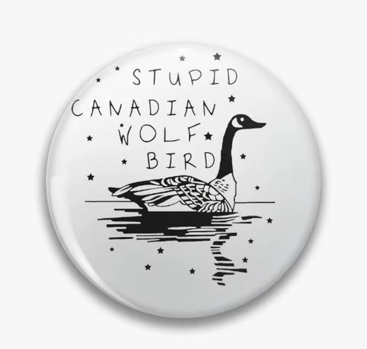 STUPID CANADIAN WOLF BIRD SMALL BUTTON 1.25IN