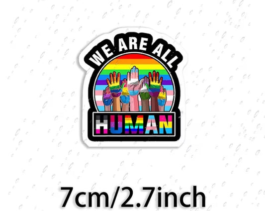 WE ARE ALL HUMAN STICKER